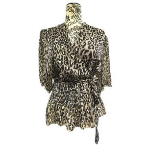 Animal print blouse with elasticized waist and sash
